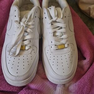 Nike Kids White Sneakers with Gold Accent
